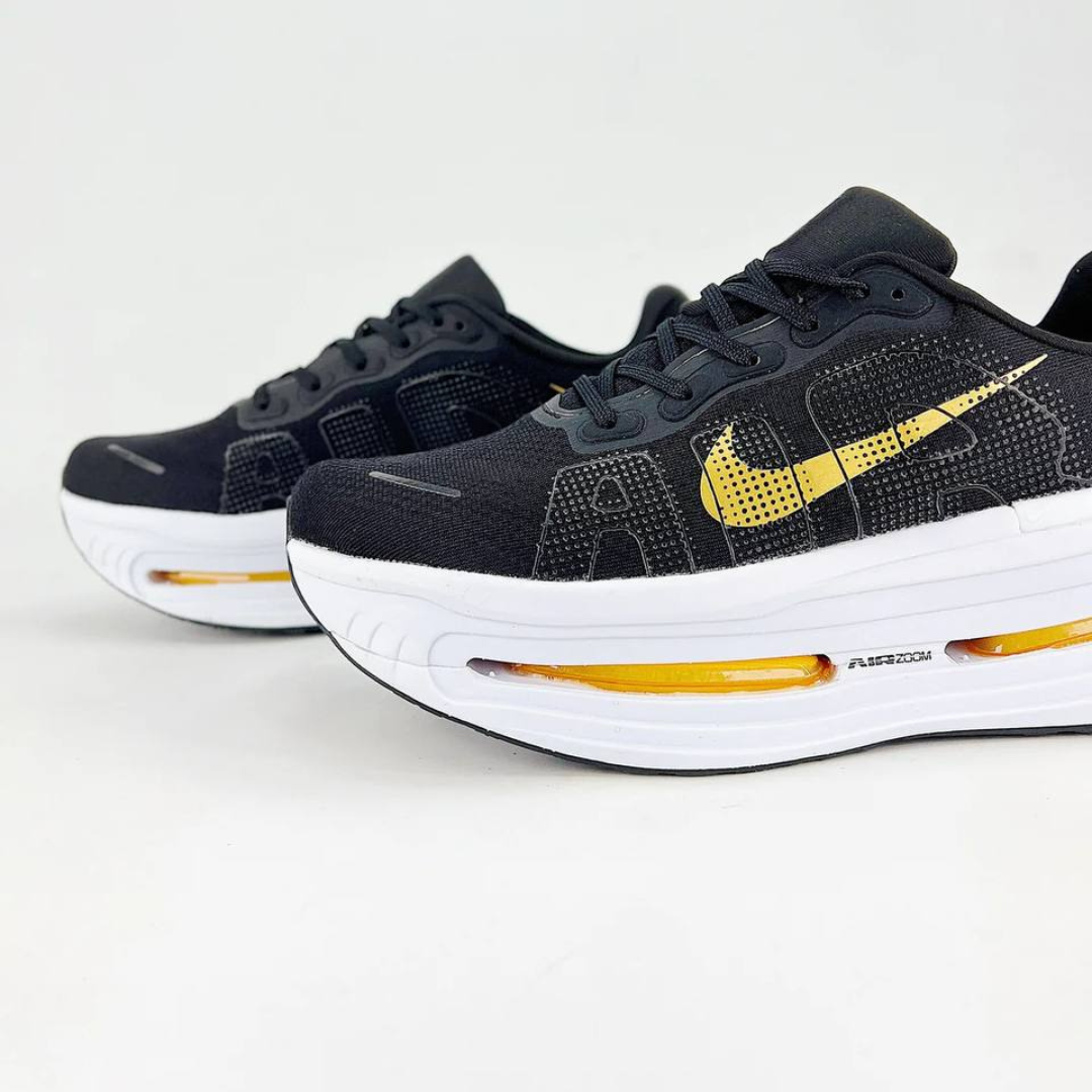 Nike Vomero Premium™ – Black Shadow w/ Metallic Gold