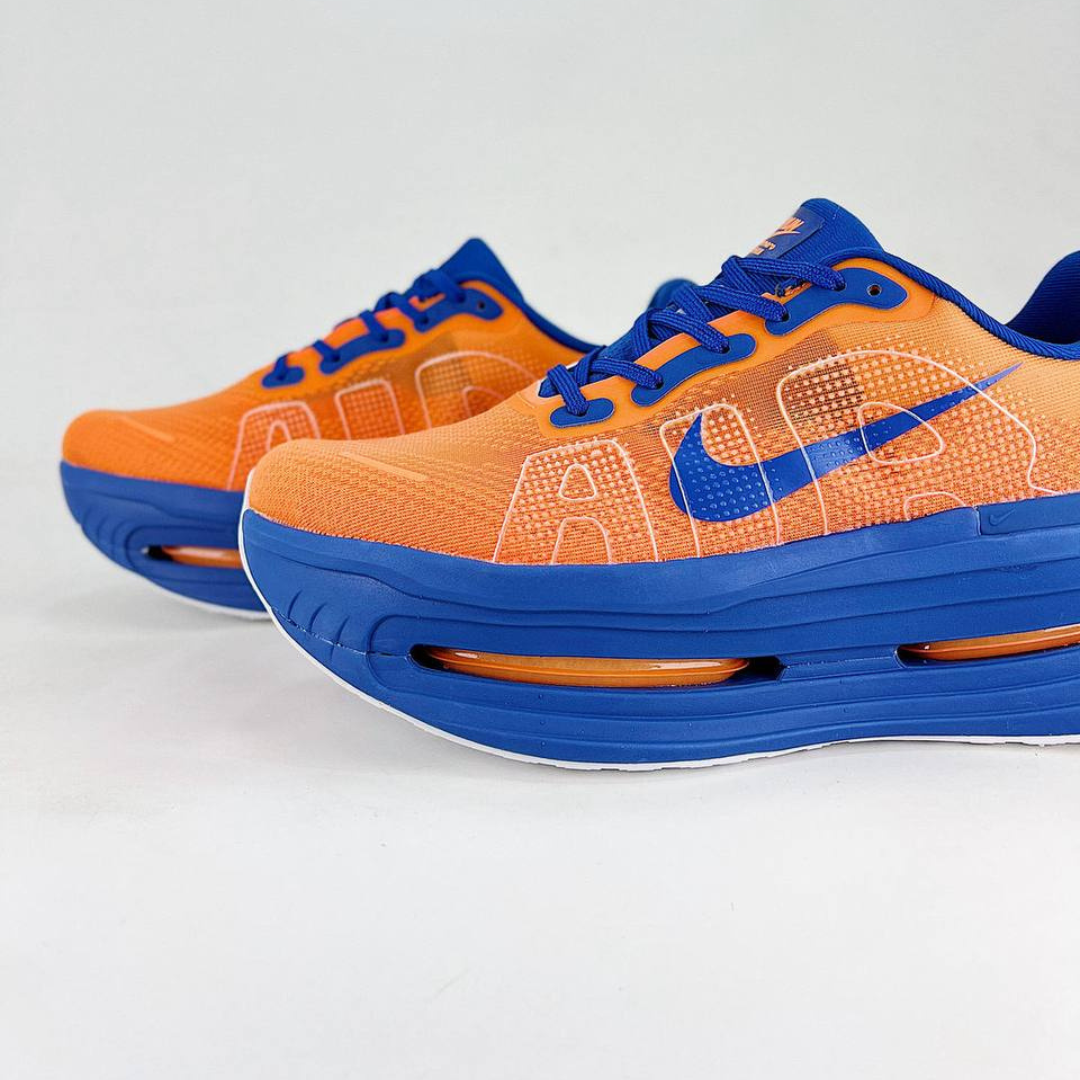 Nike Vomero Premium™ – Orange coucher de soleil avec bleu océan et blanc luminescent