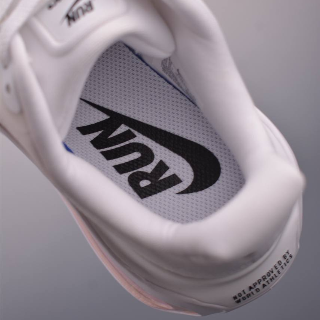Nike Vomero Premium™ – Blanc brillant avec Rose vif
