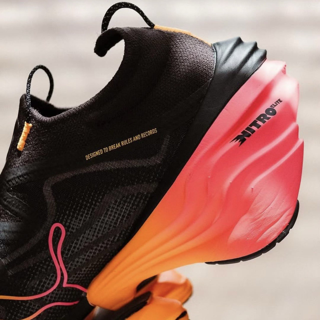 Puma Fast-RB Nitro Elite™ – Noir avec orange et rose