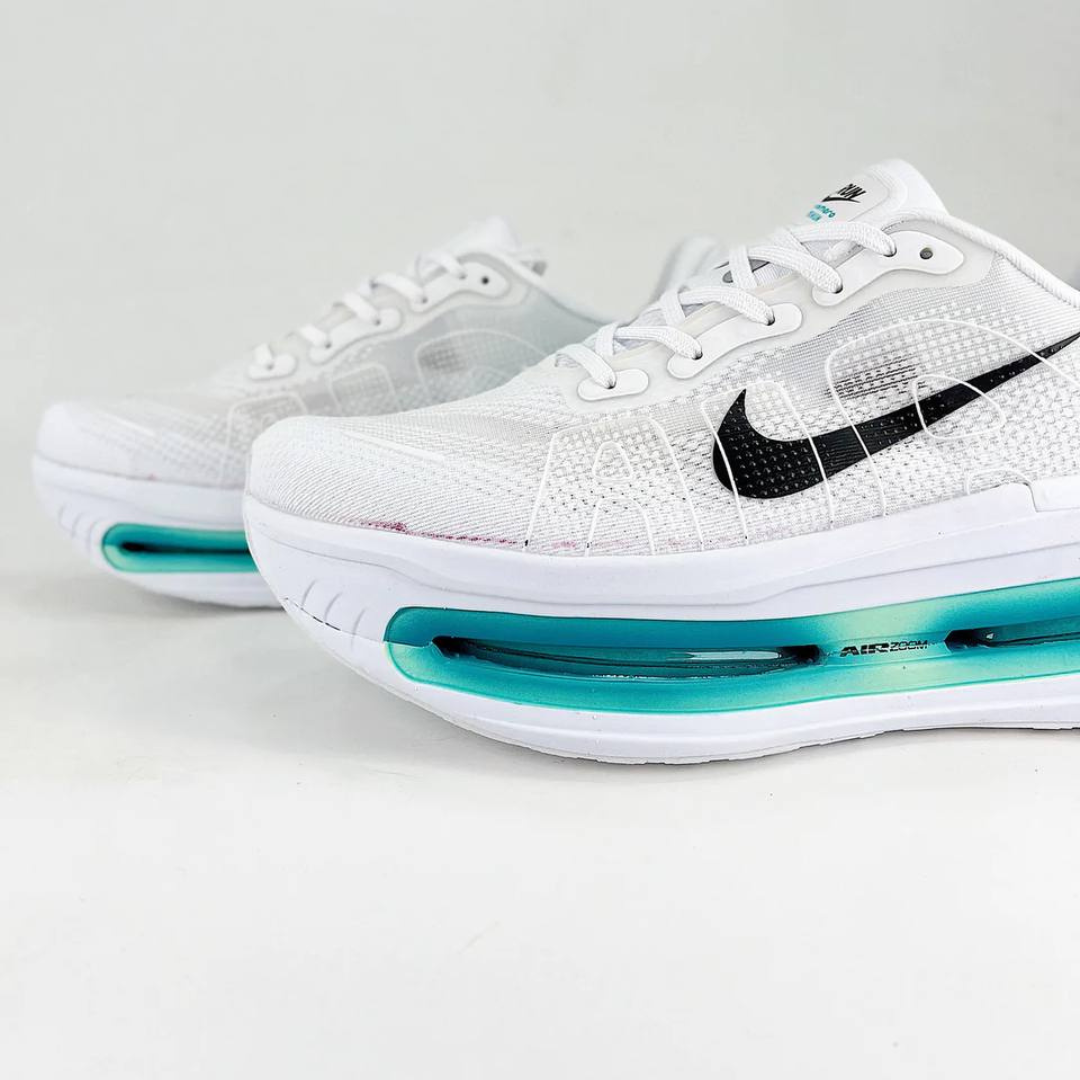 Nike Vomero Premium™ – Blanc brillant avec bleu turquoise