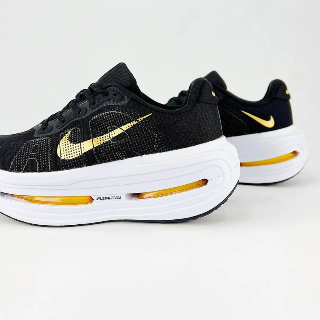 Nike Vomero Premium™ – Black Shadow w/ Metallic Gold