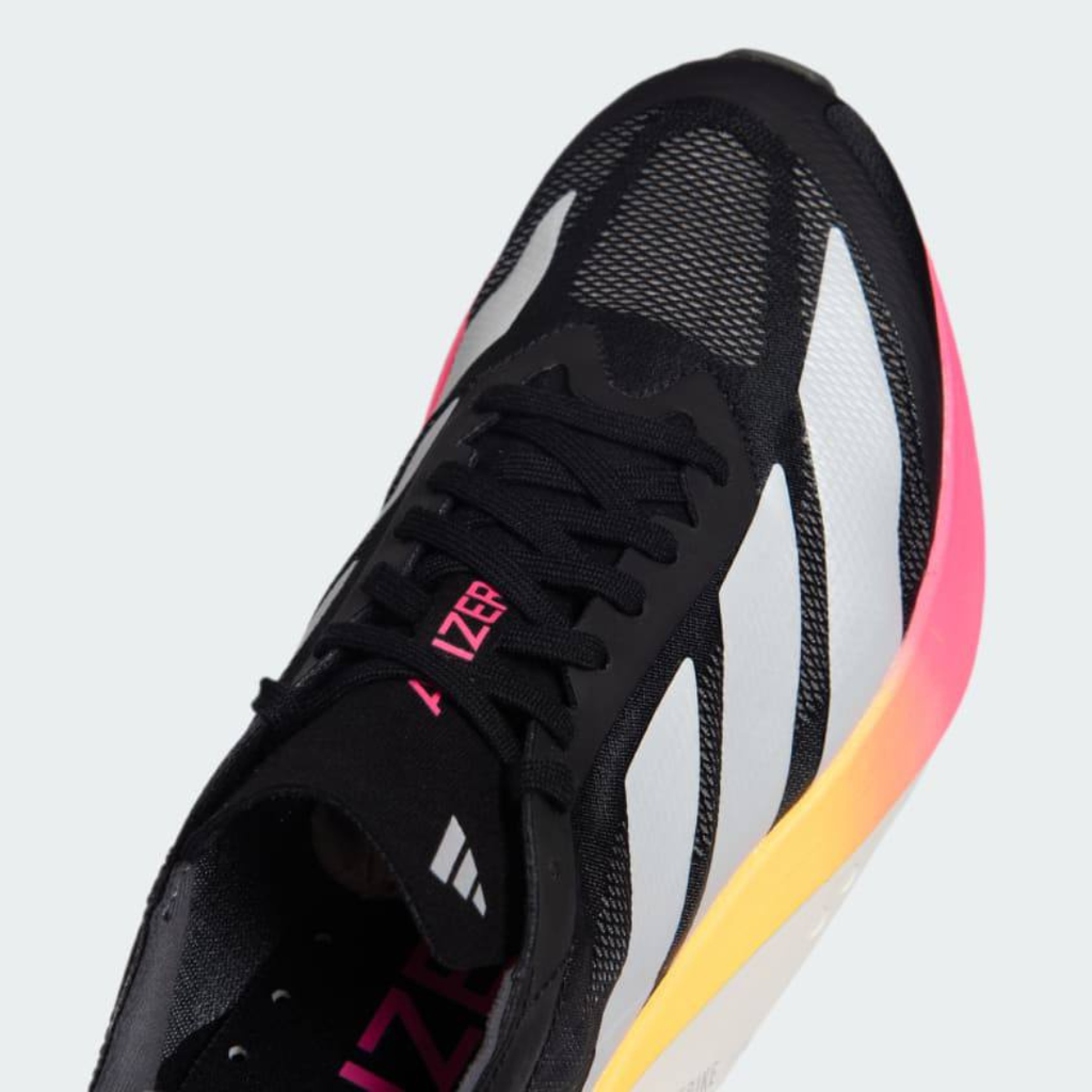 Adidas Adizero Drive RC™ – Core Black avec White, Zero Metallic et Spark