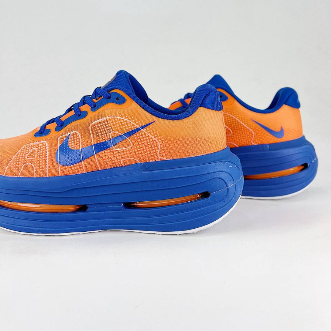 Nike Vomero Premium™ – Orange coucher de soleil avec bleu océan et blanc luminescent