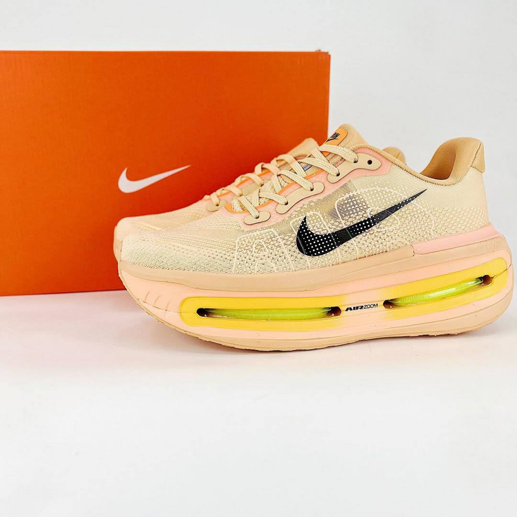 Nike Vomero Premium™ – Orange coucher de soleil avec Ombre noire