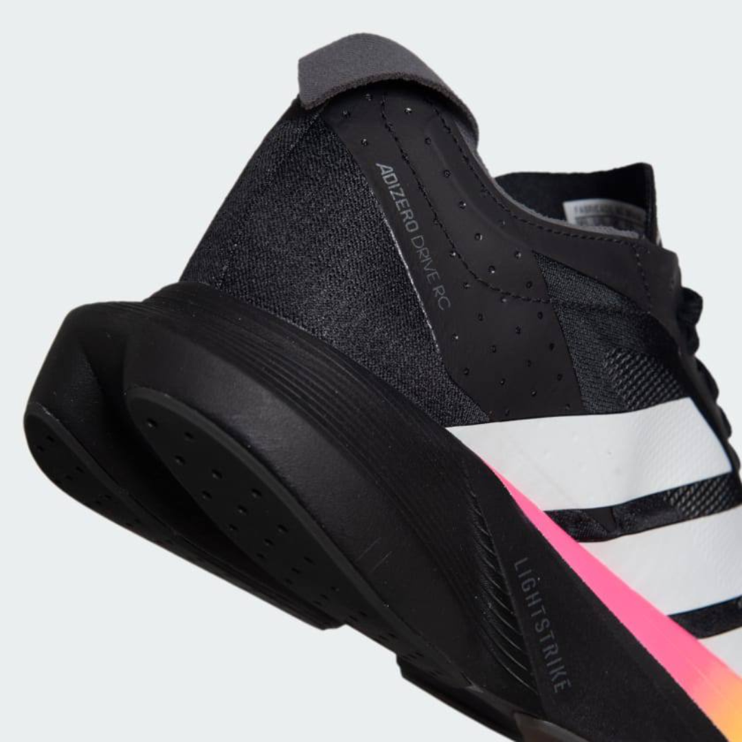 Adidas Adizero Drive RC™ – Core Black avec Zero Metallic et Spark