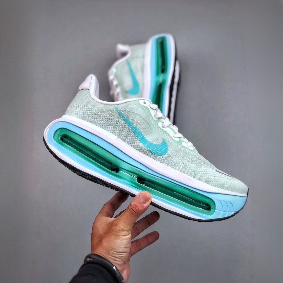 Nike Vomero Premium™ – Green Surge with Ocean Blue