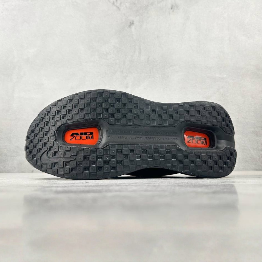 Nike Vomero Premium™ – Black Shadow avec Sunset Orange
