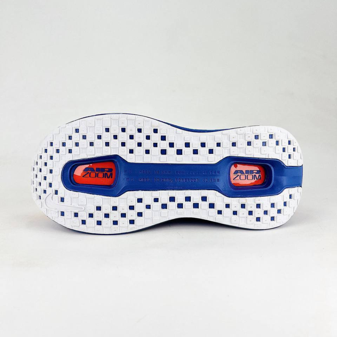 Nike Vomero Premium™ – Orange coucher de soleil avec bleu océan et blanc luminescent