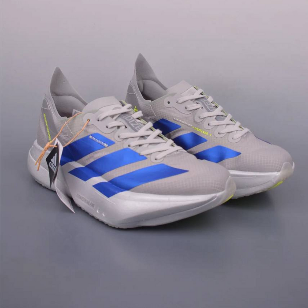 Adidas Adizero Adios Pro 4™ – Gris Métallisé avec Bleu