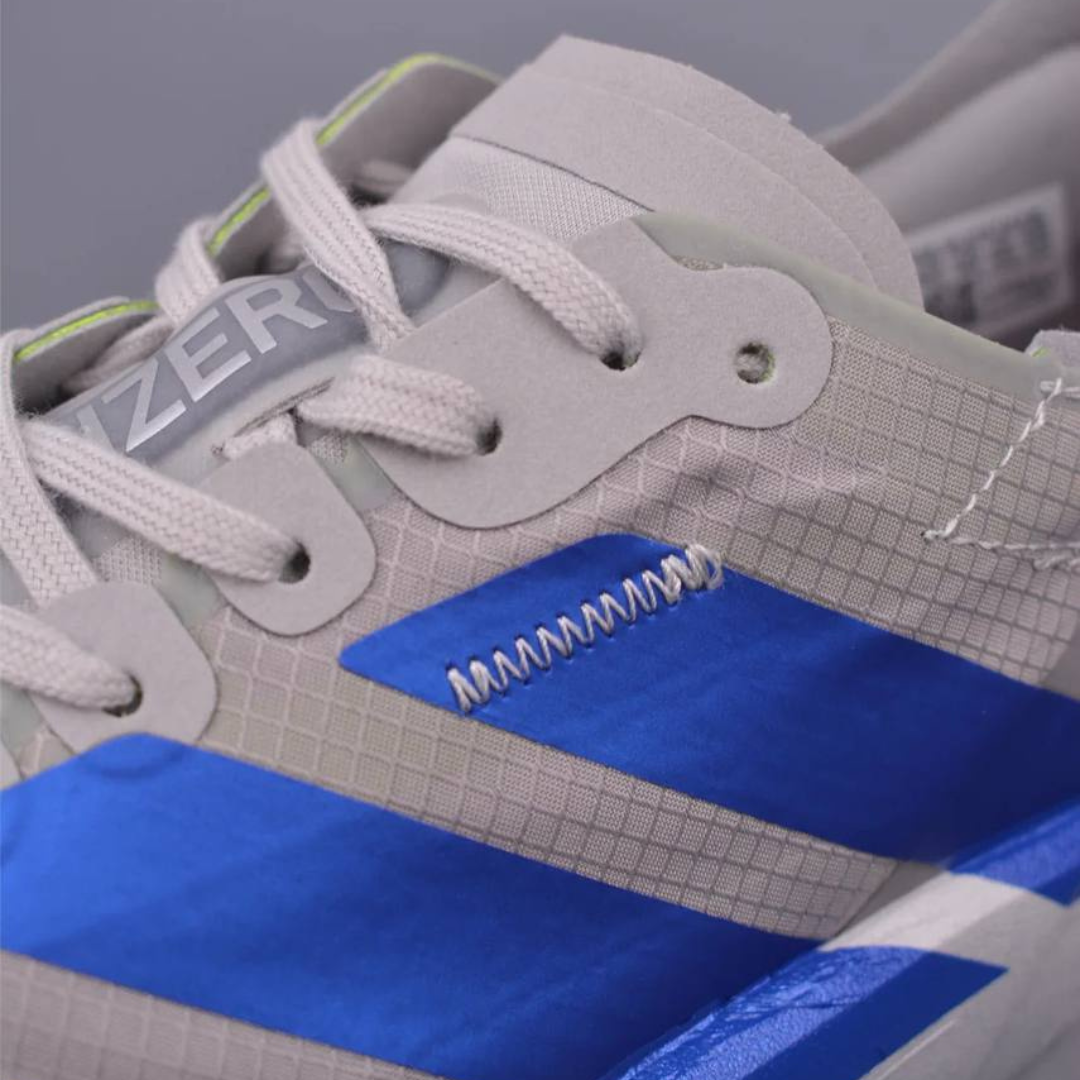 Adidas Adizero Adios Pro 4™ – Gris Métallisé avec Bleu