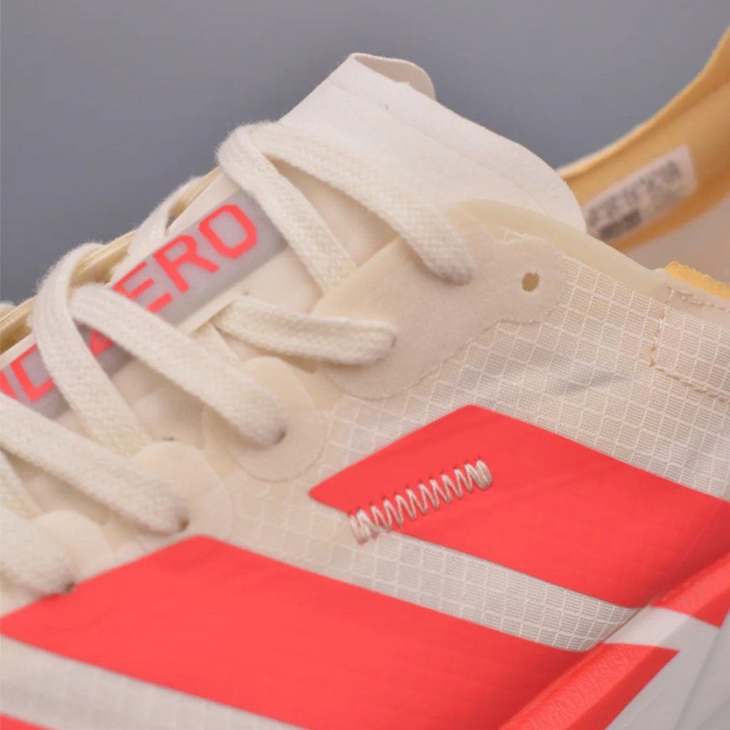 Adidas Adizero Adios Pro 4™ – Beige avec Rouge
