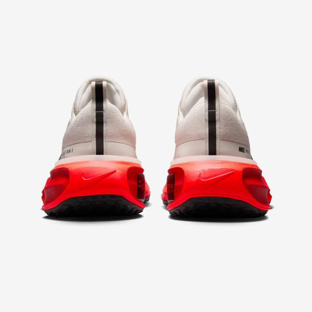 Nike ZoomX Invincible Run 3™ – Blanc Charge avec Cramoisi Néon