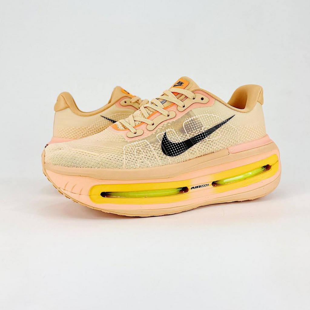 Nike Vomero Premium™ – Orange coucher de soleil avec Ombre noire
