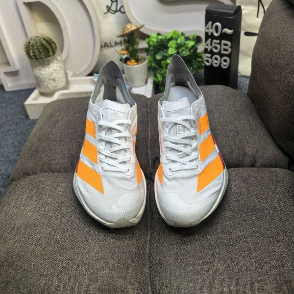 Adidas Adizero Adios Pro 4™ – Blanc avec Orange