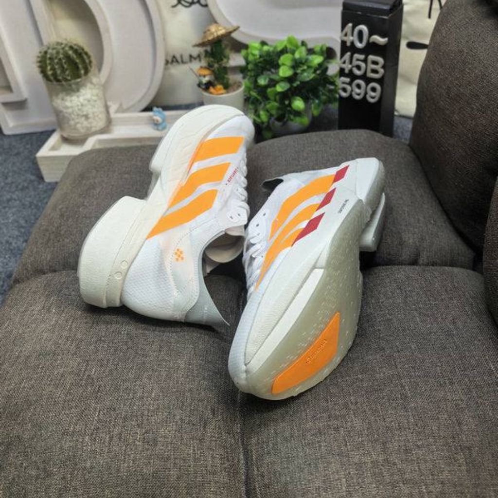 Adidas Adizero Adios Pro 4™ – Blanc avec Orange
