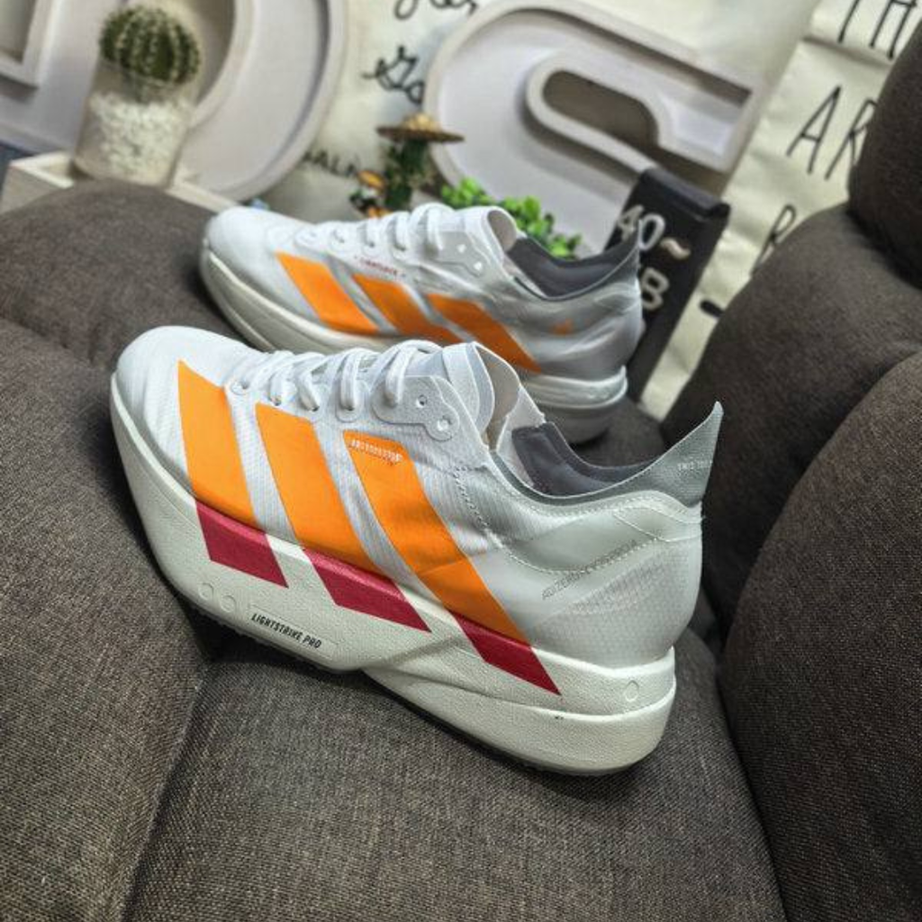 Adidas Adizero Adios Pro 4™ – Blanc avec Orange