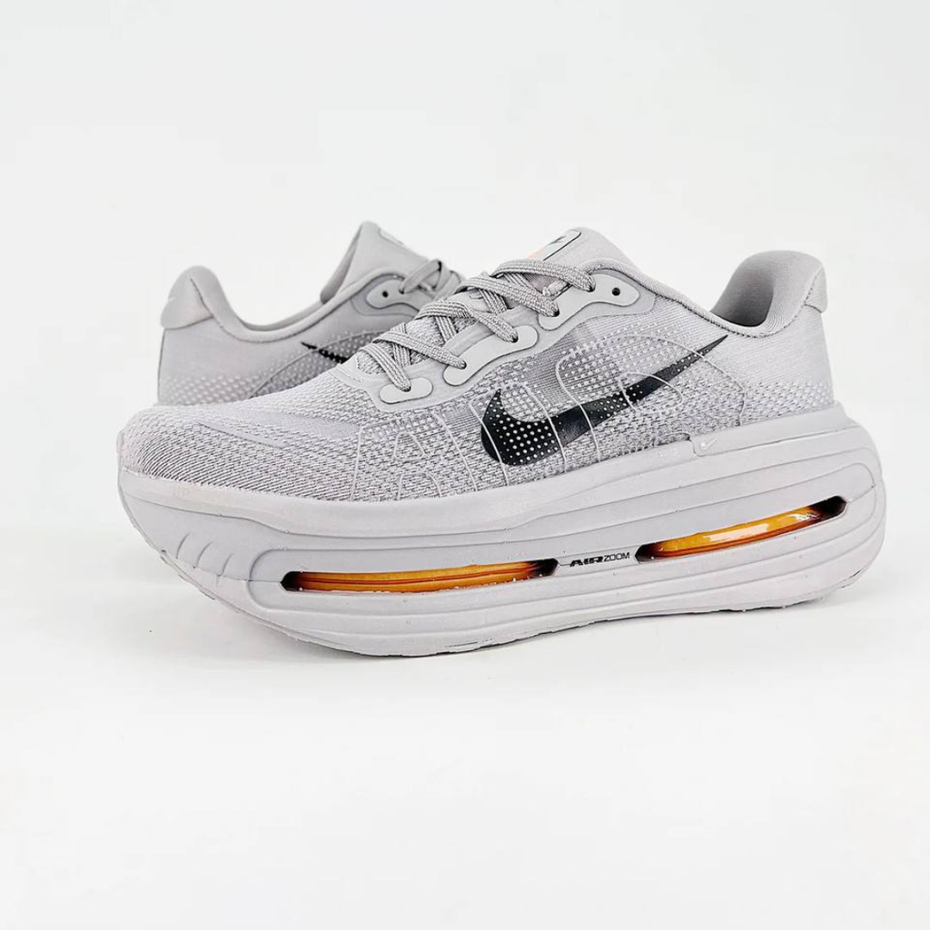 Nike Vomero Premium™ – Gris Acier avec Orange Couché de soleil