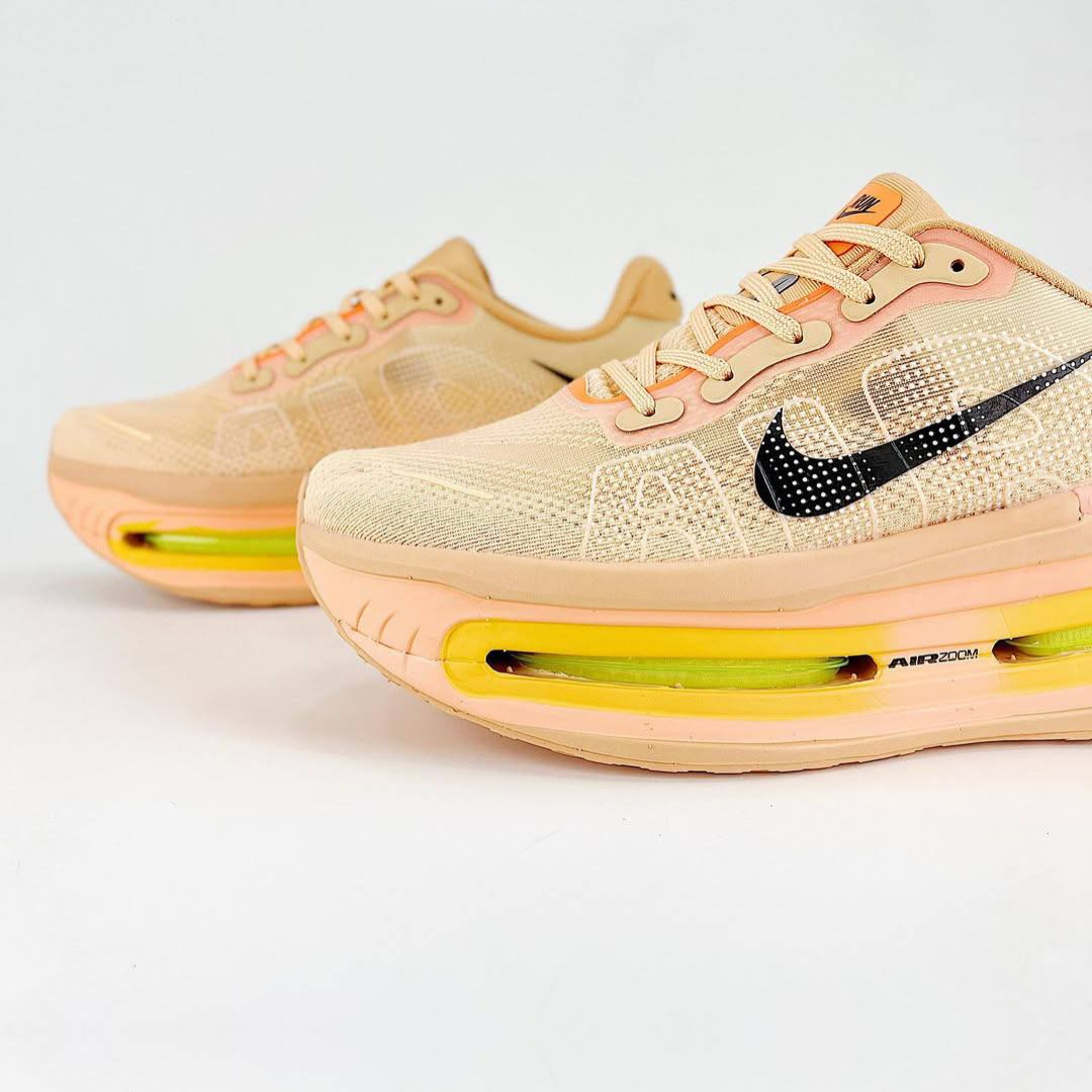 Nike Vomero Premium™ – Orange coucher de soleil avec Ombre noire