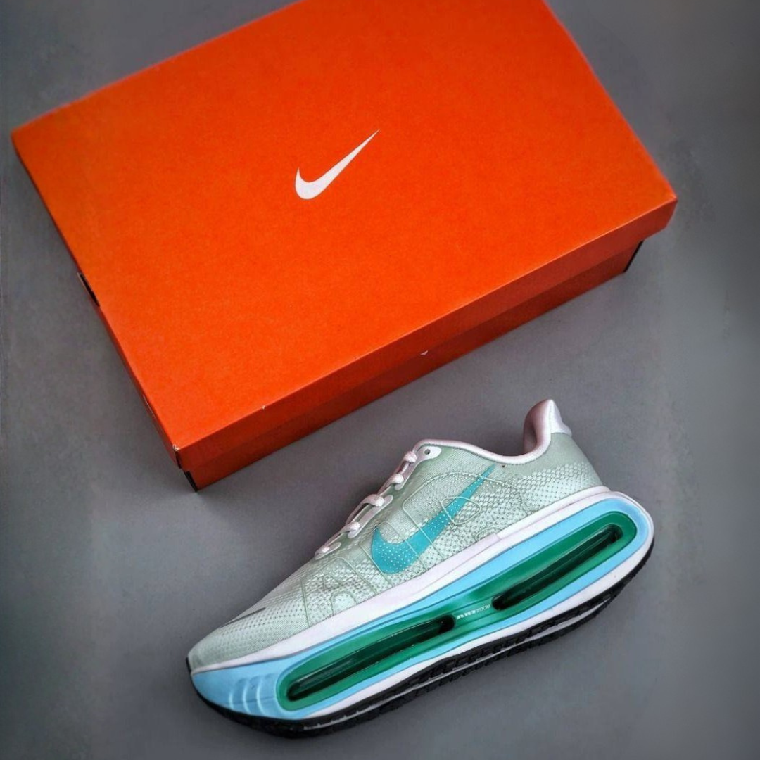 Nike Vomero Premium™ – Green Surge with Ocean Blue