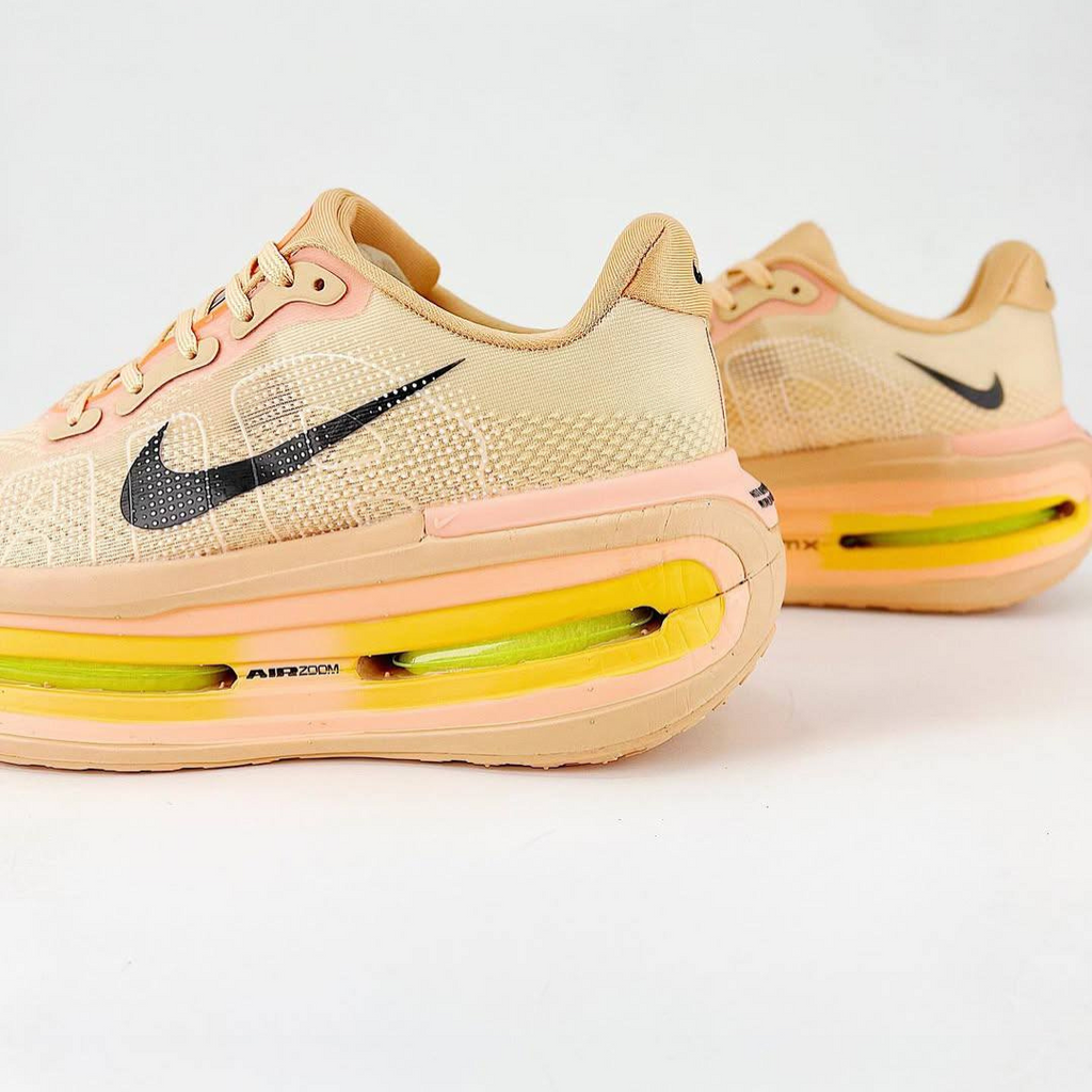 Nike Vomero Premium™ – Orange coucher de soleil avec Ombre noire
