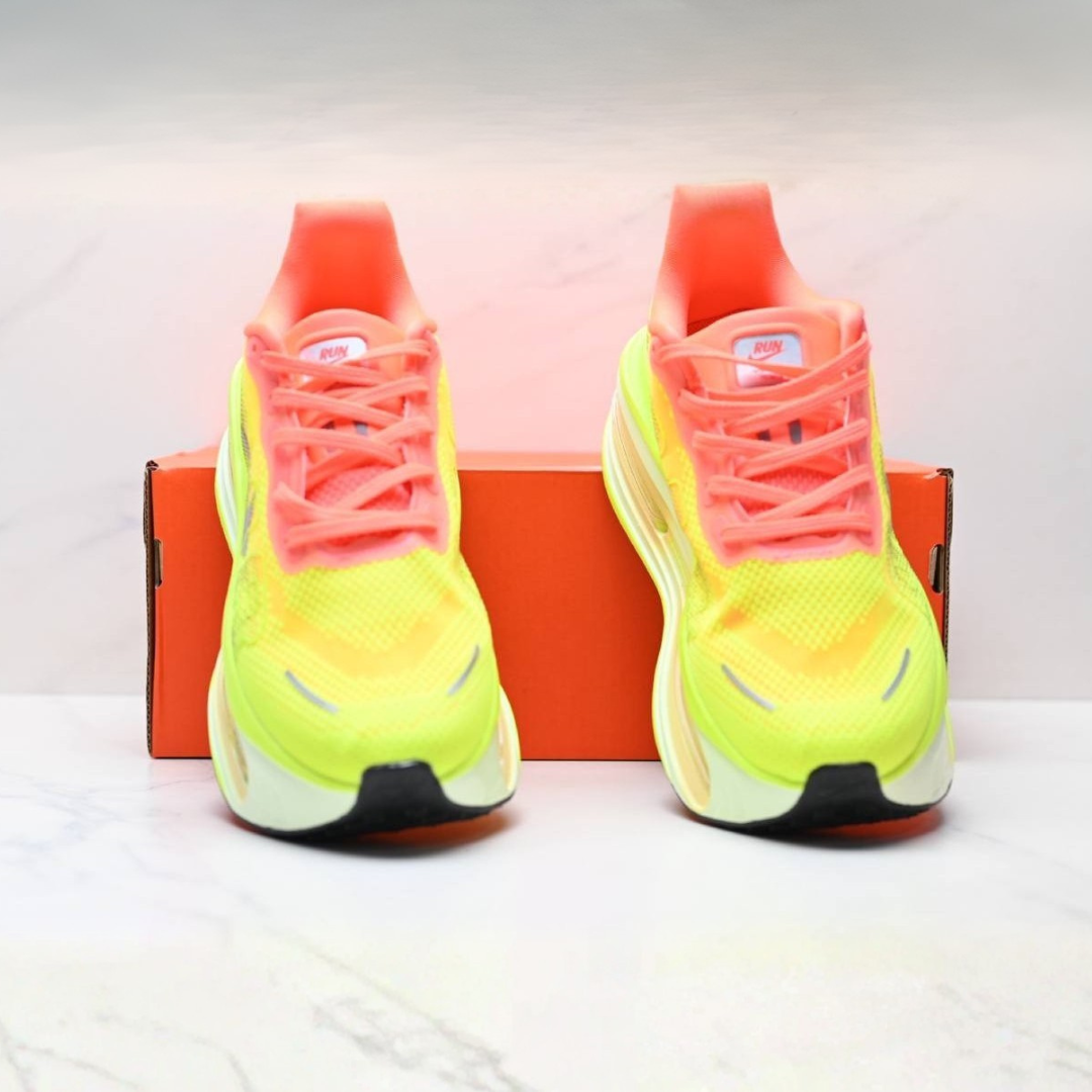 Nike Vomero Premium™ – Jaune Volt avec orange coucher de soleil
