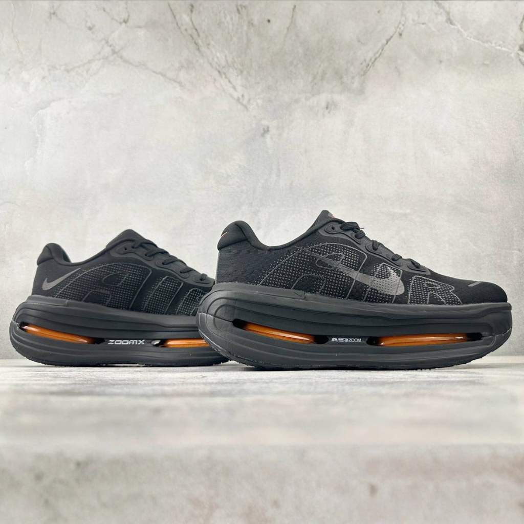 Nike Vomero Premium™ – Black Shadow avec Sunset Orange