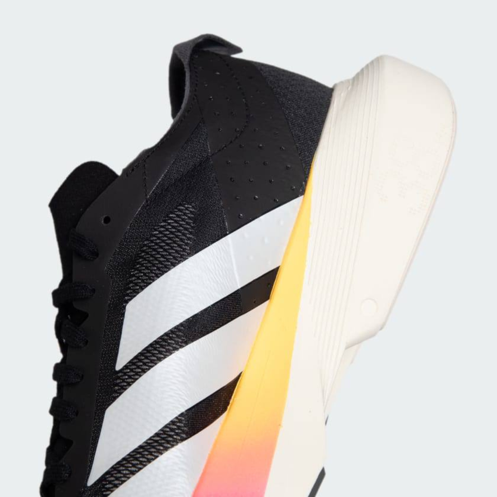 Adidas Adizero Drive RC™ – Core Black avec White, Zero Metallic et Spark