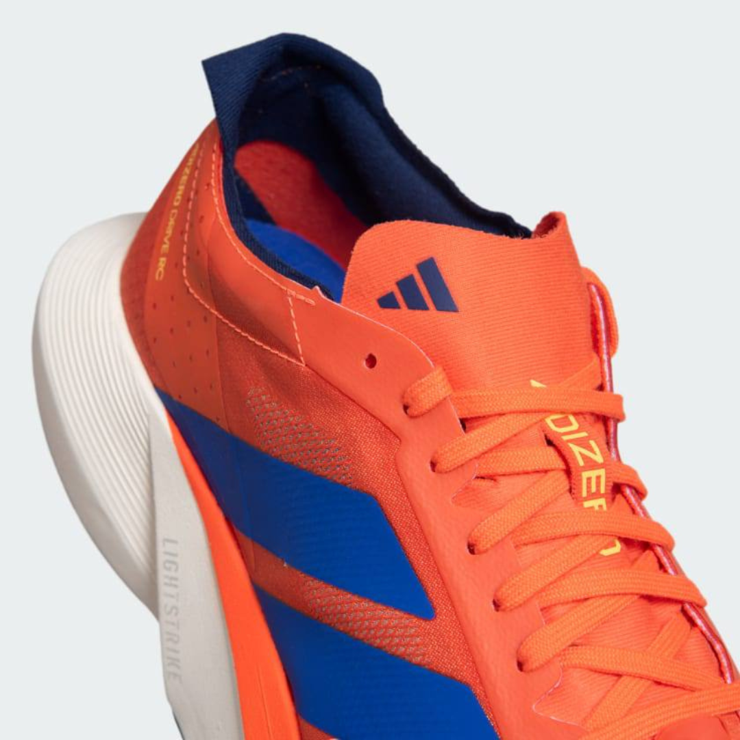 Adidas Adizero Drive RC™ – Impact Orange avec Lucid Blue et Spark