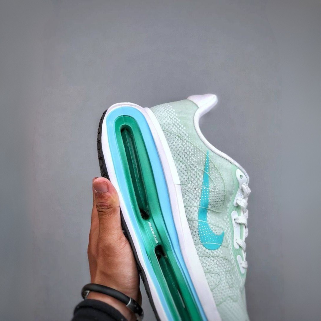 Nike Vomero Premium™ – Green Surge with Ocean Blue