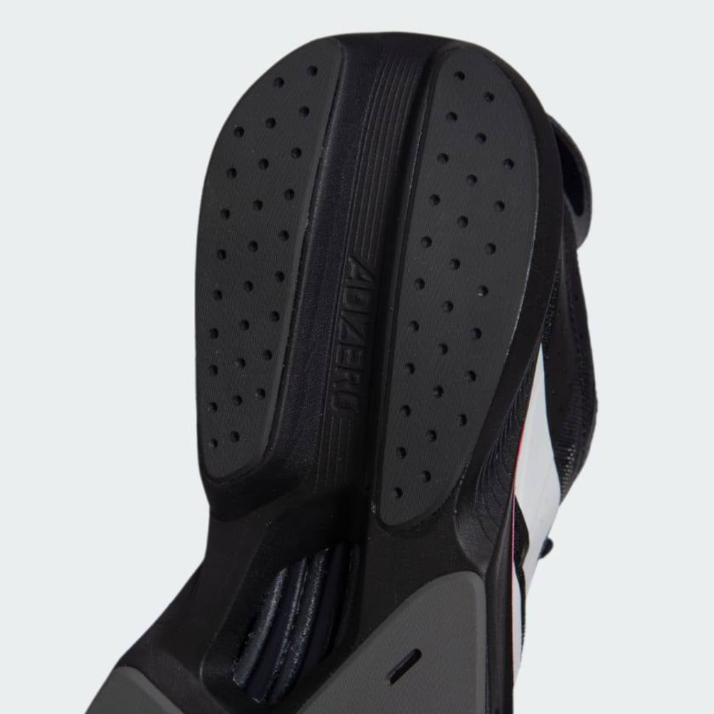 Adidas Adizero Drive RC™ – Core Black avec Zero Metallic et Spark