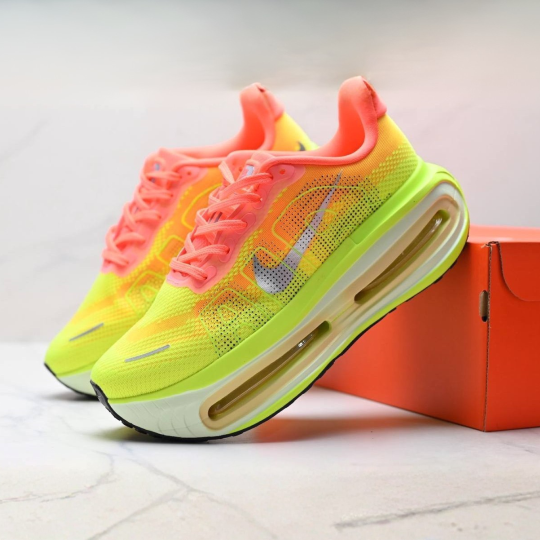 Nike Vomero Premium™ – Jaune Volt avec orange coucher de soleil