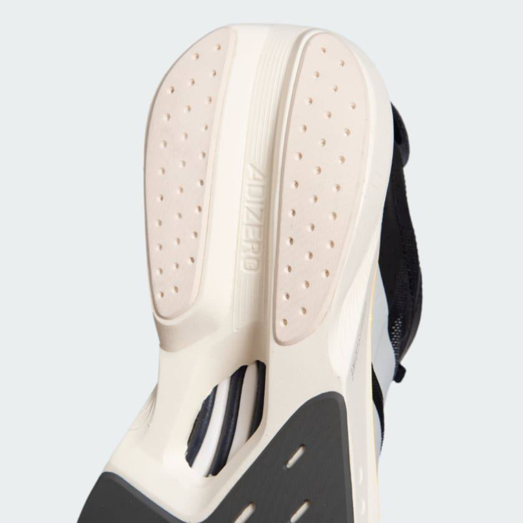 Adidas Adizero Drive RC™ – Core Black avec White, Zero Metallic et Spark