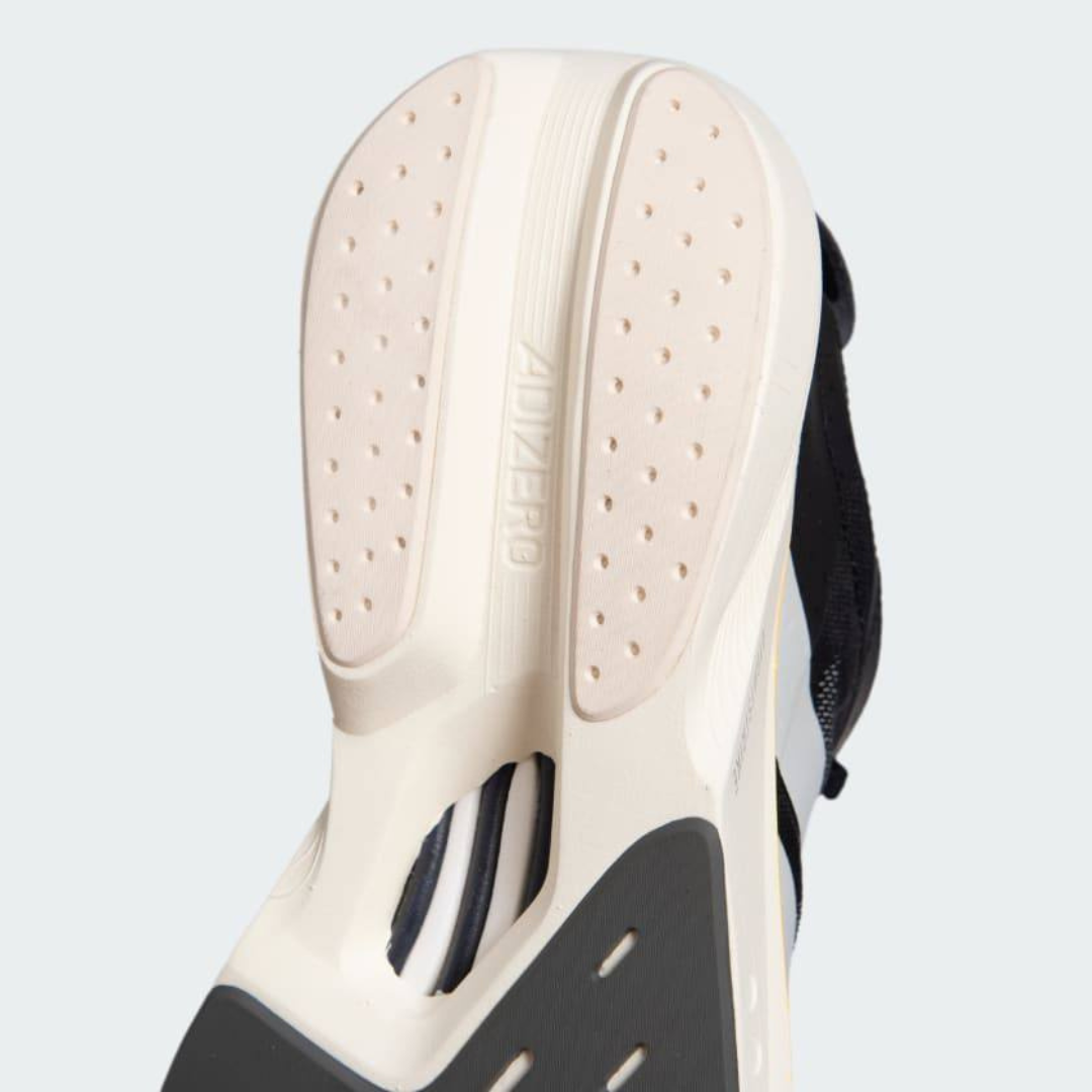 Adidas Adizero Drive RC™ – Core Black avec White, Zero Metallic et Spark