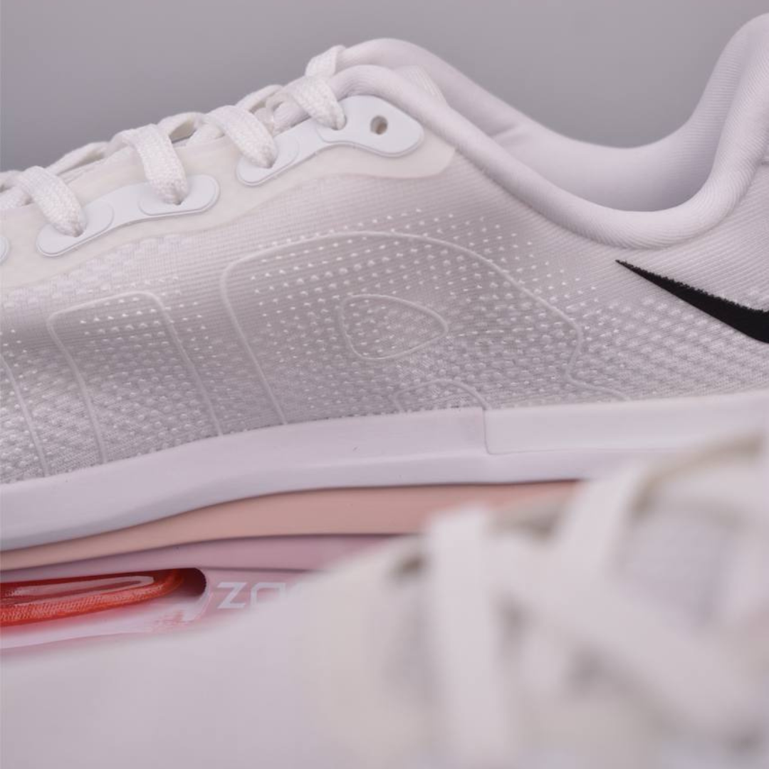 Nike Vomero Premium™ – Blanc brillant avec Rose vif