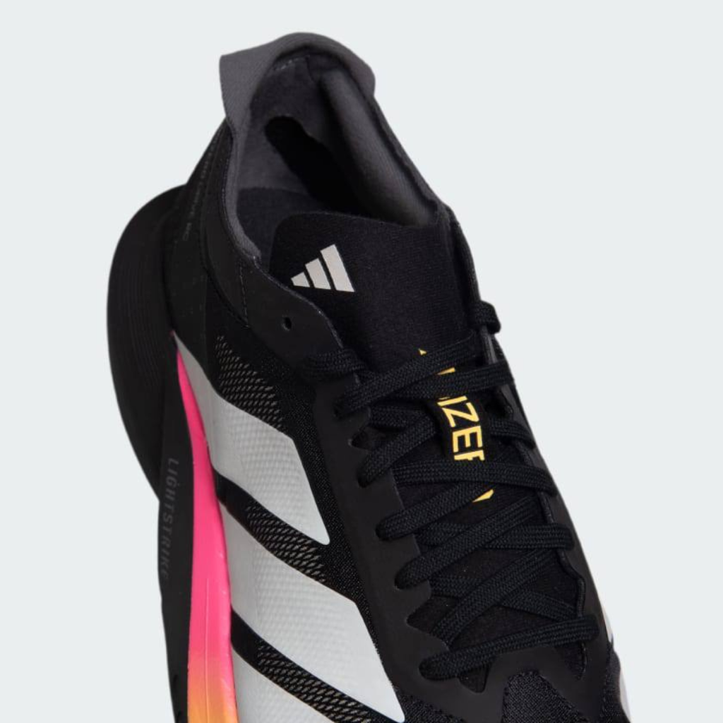 Adidas Adizero Drive RC™ – Core Black avec Zero Metallic et Spark