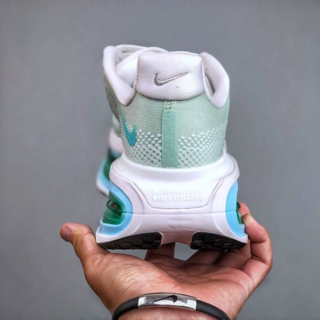 Nike Vomero Premium™ – Green Surge with Ocean Blue