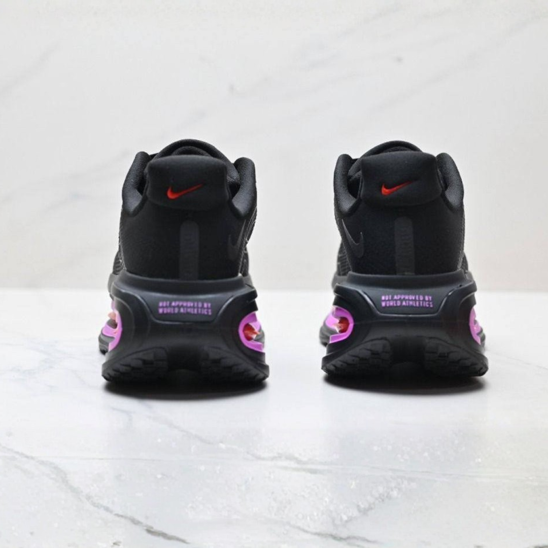Nike Vomero Premium™ – Noir Shadow c/ Violet Pulse