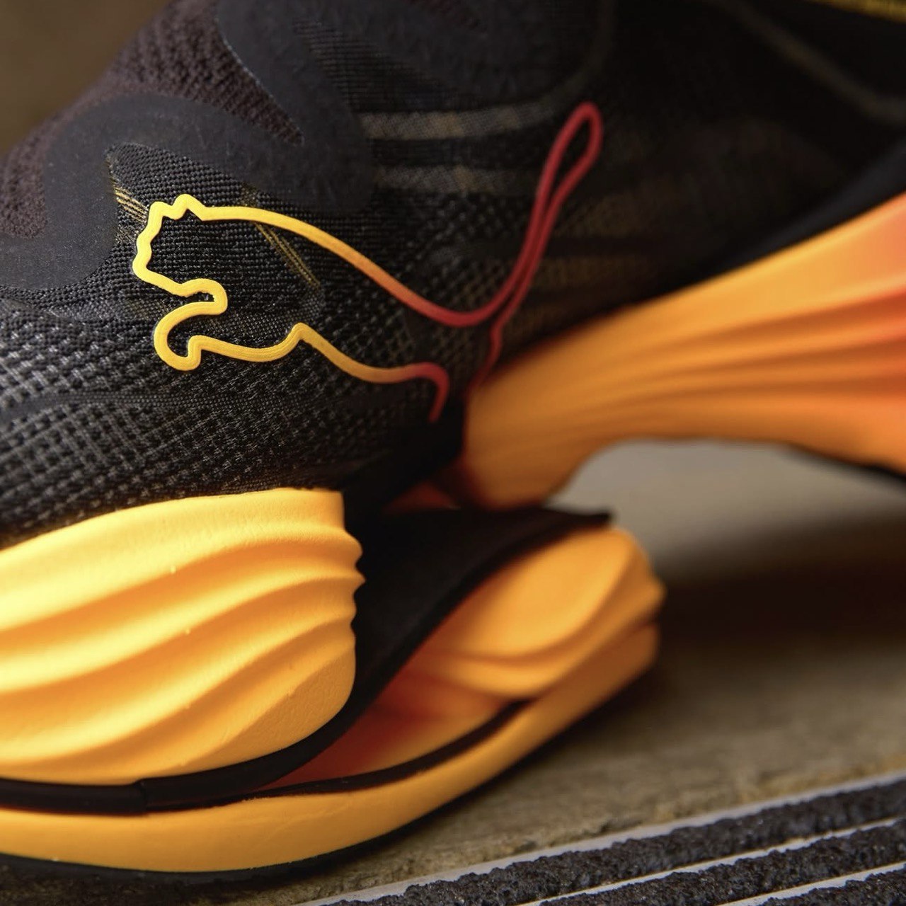 Puma Fast-RB Nitro Elite™ – Noir avec orange et rose
